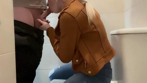 Busty Student Pleasures a Guy in the Hallway Bathrooms!