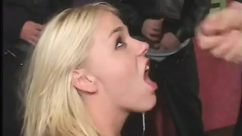 Blonde bombshell goes down on a group of unusual studs