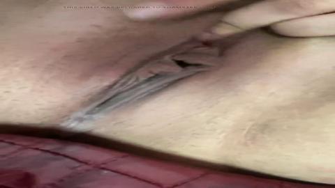 Masturbating her slippery clitoris to intense arousal