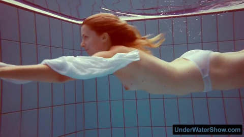 Naughty😈 redheaded nympho in a dripping wet white dress & sultry bikini
