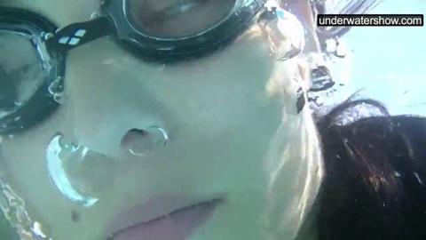 Submerged underwater with a dick inside her