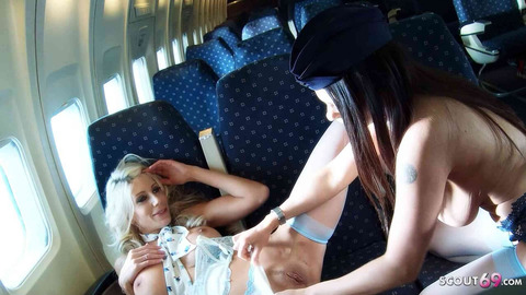 Lesbian Stewardesses with Big Tits F*** on Board