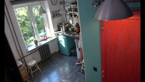 Blonde nymphette services an elderly man in the kitchen