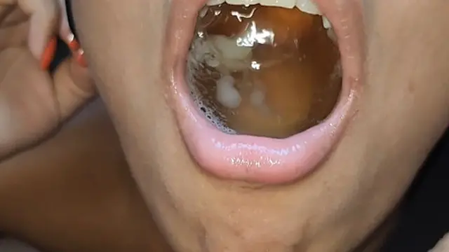 Pouring urine and ejaculating into her mouth