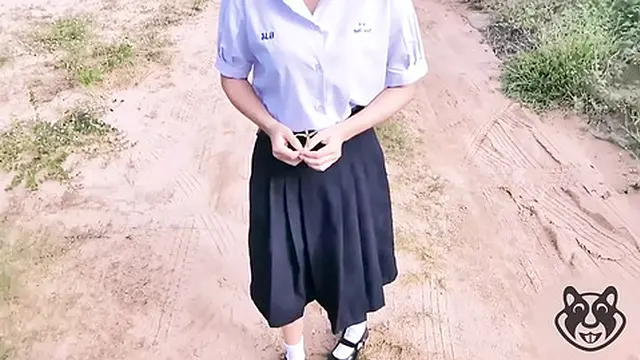 Thai girl outdoors in forest with melon ice