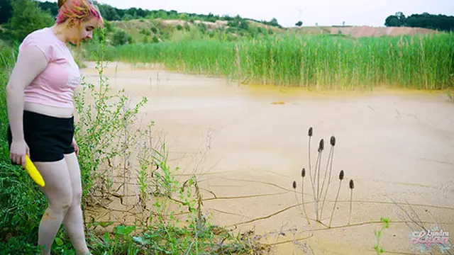 Orgasm in lake of mud - masturbating in clay