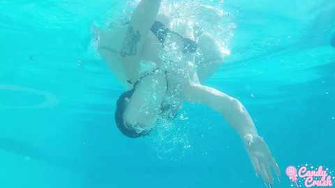 petite teen nude in the swimming pool