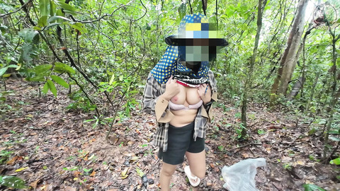 Thai girls walk and play to pick mushrooms in the forest, secretly showing in the deep forest. Clear Thai voice