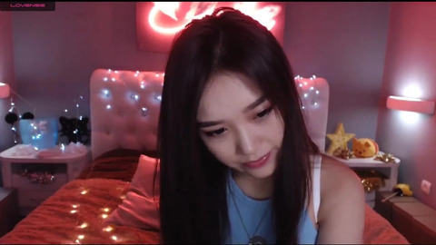 Young beautiful Asian girl in front of the camera