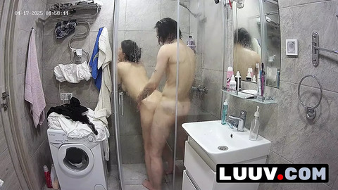 LUUV. Tattooed Alice joins her boyfriend in the shower. The webcam is on