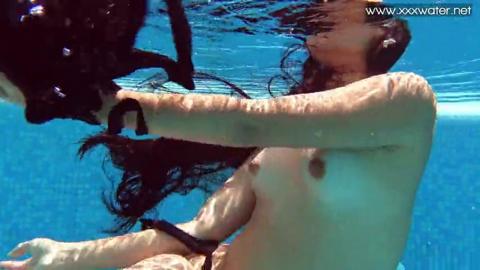Sexy Latina babe Andreina gets naked and wild pool party orgy