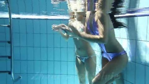 Slutty Silvie & Zhanetta get their wet and wild poolside bang going on full frontal display