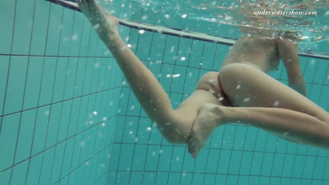 'Horny🥵 teen nymphs frolic beneath crystal waves'