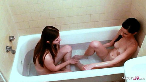 Uninhibited sisterly bliss unfolds as they surrender to passionate lesbian debauchery